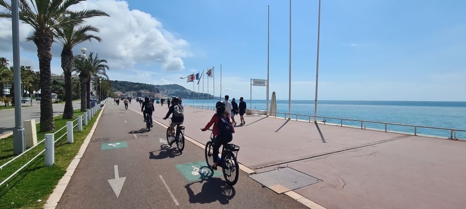 Nice: Panoramic French Riviera E-Bike Tour - Entering the Promenade des Anglais on an E-Bike